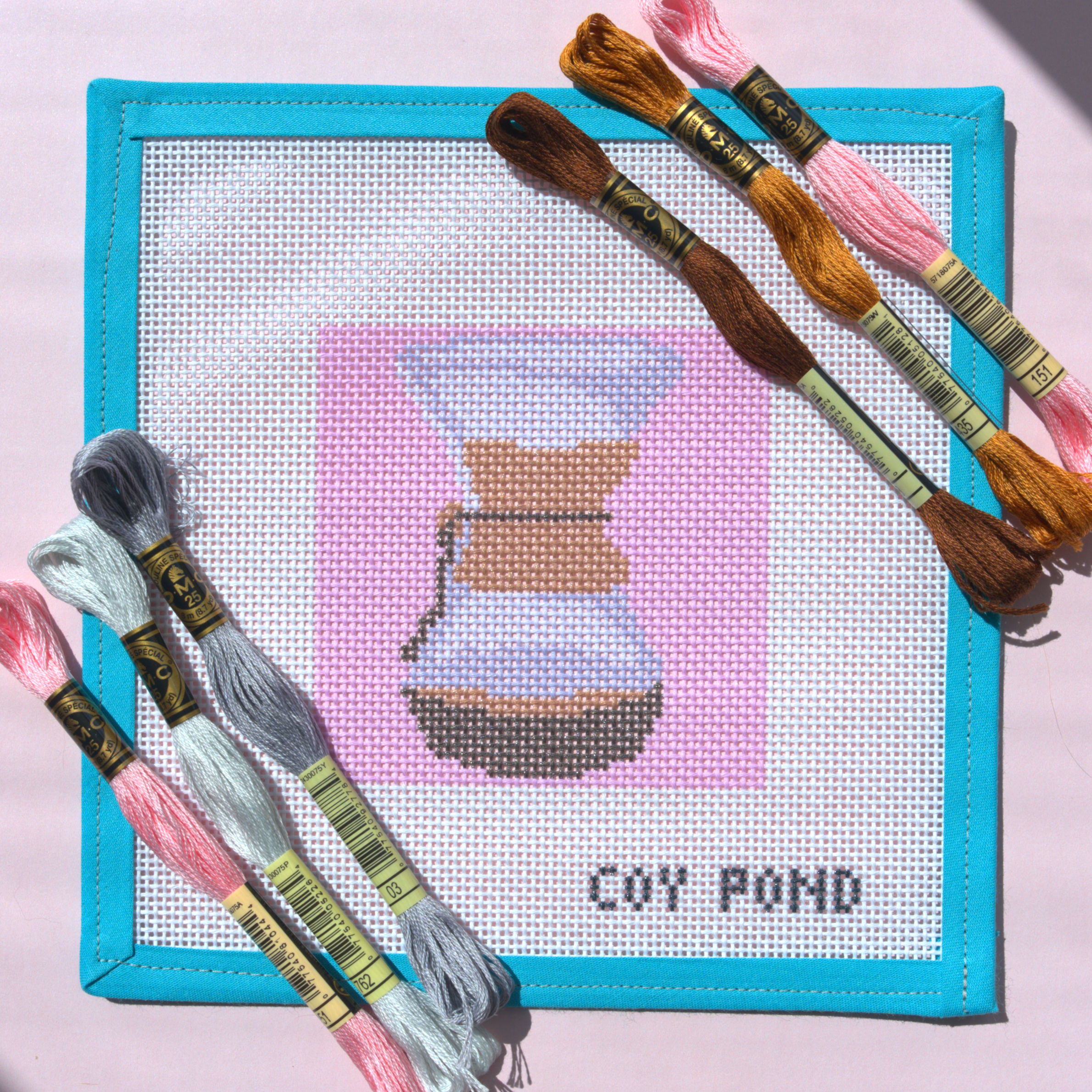Kitchen and Coffee Hourglass Coffee Maker needlepoint starter kit - 13-count stitch printed canvas with hourglass coffee maker on soft pink background