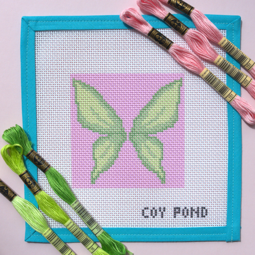 Romantasy Fairy Wings needlepoint starter kit - 13-count stitch printed canvas with delicate green fairy wings on soft pink background